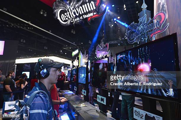 Fan plays at the Castlevania 2 Lords of Shadows display at the E3 Gaming and Technology Conference at the Los Angeles Convention Center on June 11,...