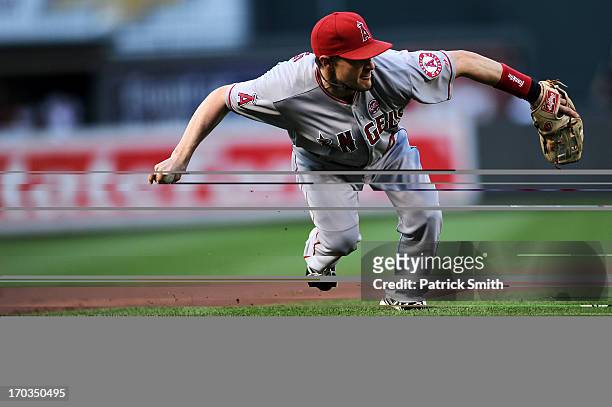 Shortstop Brendan Harris of the Los Angeles Angels of Anaheim makes a play for an out in the second inning against the Baltimore Orioles at Oriole...