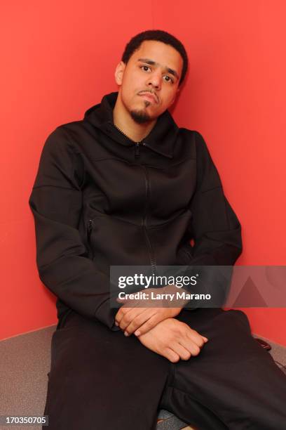 Cole poses for a portrait at Y 100 Radio station on June 11, 2013 in Miami, Florida.