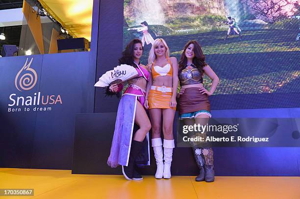 Models pose at the E3 Gaming and Technology Conference at the Los Angeles Convention Center on June 11, 2013 in Los Angeles, California.