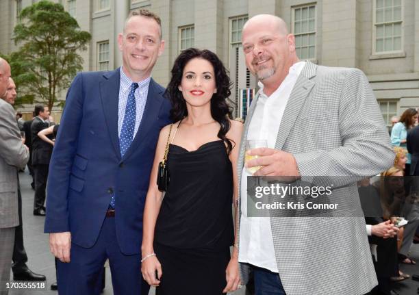 Deanna Burditt and Rick Harrison pose for a photo during a NCTA reception hosted by A+E Networks at Smithsonian American Art Museum & National...