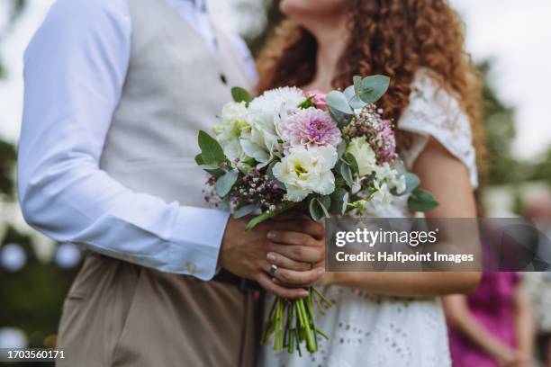 close-up of a beautiful wedding bouquet. - ranunculus wedding bouquet stock pictures, royalty-free photos & images