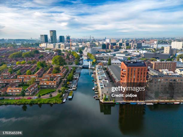 aerial view of residential district in amsterdam-noord north. - noord holland stock pictures, royalty-free photos & images