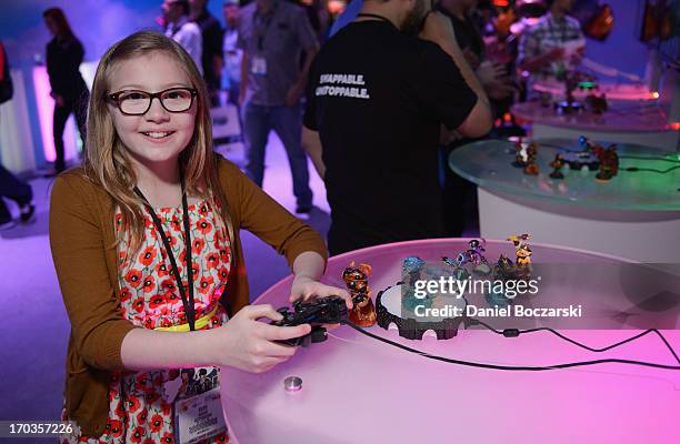 Bebe Wood plays the new Skylanders SWAP Force at Activision's E3 booth at Los Angeles Convention Center on June 11, 2013 in Los Angeles, California.