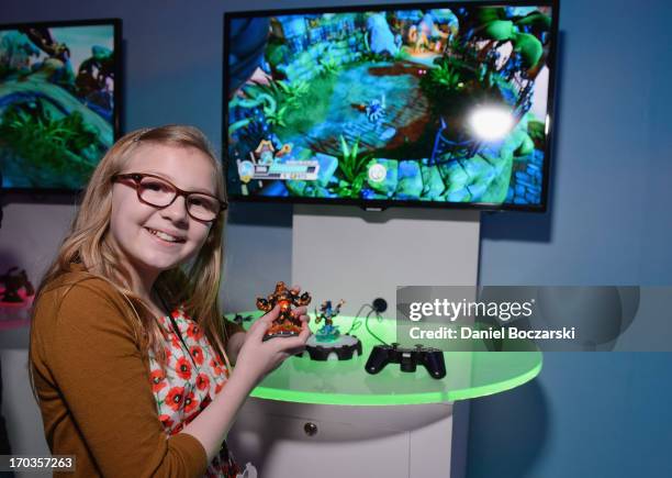 Bebe Wood plays the new Skylanders SWAP Force at Activision's E3 booth at Los Angeles Convention Center on June 11, 2013 in Los Angeles, California.