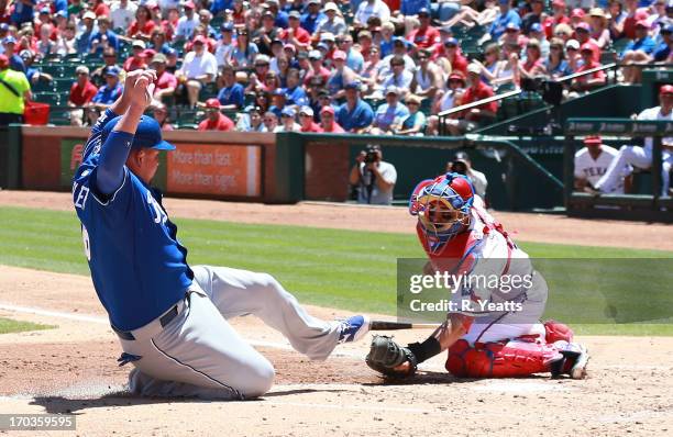 Geovany Soto of the Texas Rangers tags out Billy Butler of the Kansas City Royals at Rangers Ballpark in Arlington on June 2, 2013 in Arlington,...