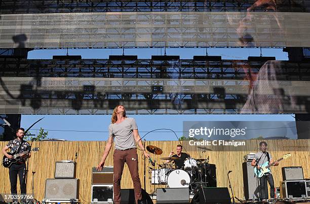 Drew Stewart, Aaron Bruno, Hayden Scott and Devin Hoffman of Awolnation perform during the 21st annual KROQ Weenie Roast at Verizon Wireless...