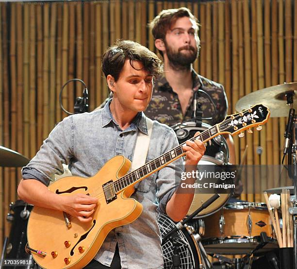 Ezra Koenig and Chris Tomson of Vampire Weekend perform during the 21st annual KROQ Weenie Roast at Verizon Wireless Amphitheater on May 18, 2013 in...