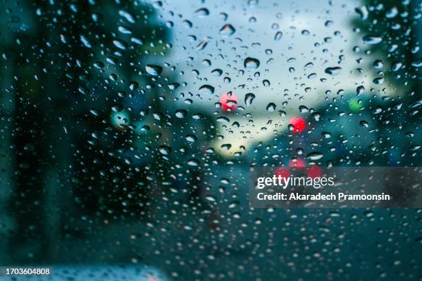raindrops stuck to car windshield - raindrop stock pictures, royalty-free photos & images