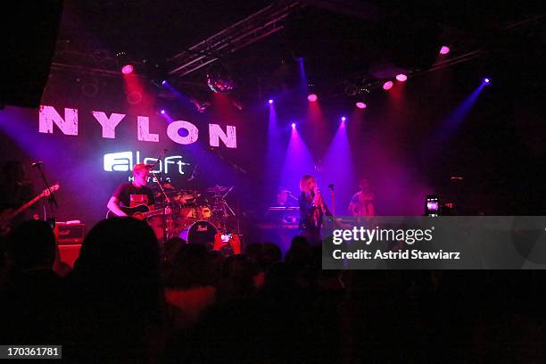 Avril Lavigne perform as NYLON and Aloft Hotels Celebrate The June/July Music Issue at the Highline Ballroom on June 11, 2013 in New York City.