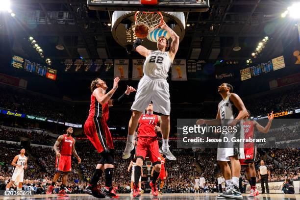 Tiago Splitter of the San Antonio Spurs dunks against the Miami Heat during Game Three of the 2013 NBA Finals on June 11, 2013 at AT&T Center in San...