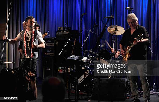 Singer/songwriter Paul Rodgers and guitarist/songwriter Mick Ralphs perform during An Evening With Bad Company at The GRAMMY Museum on June 11, 2013...