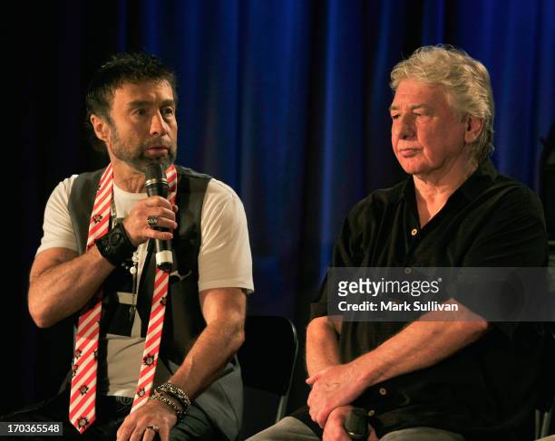 Singer/songwriter Paul Rodgers and guitarist/songwriter Mick Ralphs onstage during An Evening With Bad Company at The GRAMMY Museum on June 11, 2013...