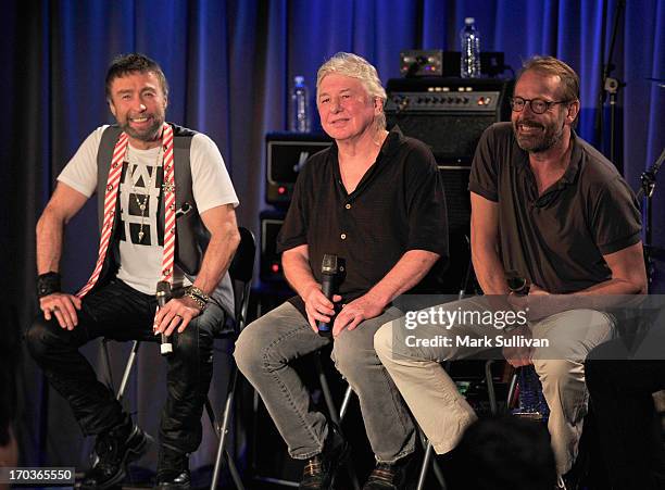 Bad Company members Singer/songwriter Paul Rodgers, guitarist/songwriter Mick Ralphs and drummer Simon Kirke onstage during An Evening With Bad...