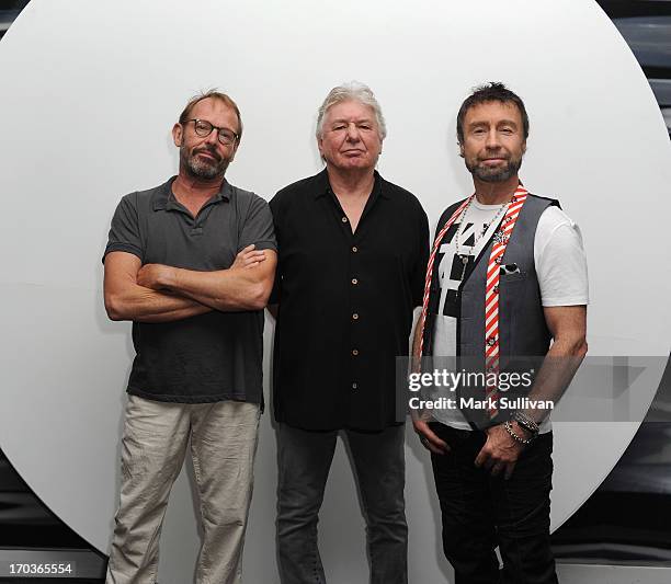 Bad Company members drummer Simon Kirke, guitarist/songwriter Mick Ralphs and singer/songwriter Paul Rodgers pose in the museum before An Evening...