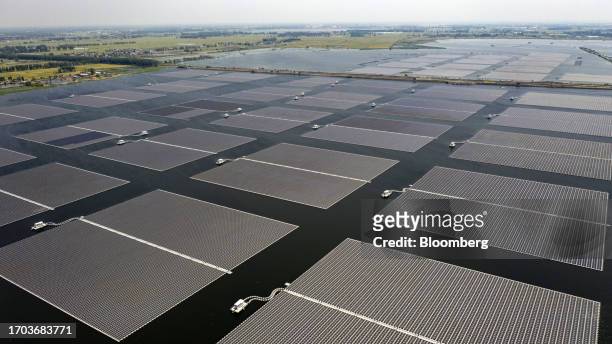 Floating solar farm of Sungrow Power Supply Co., built on the site of a former coal mine, since filled with water, in Huainan, China, on Monday, May...