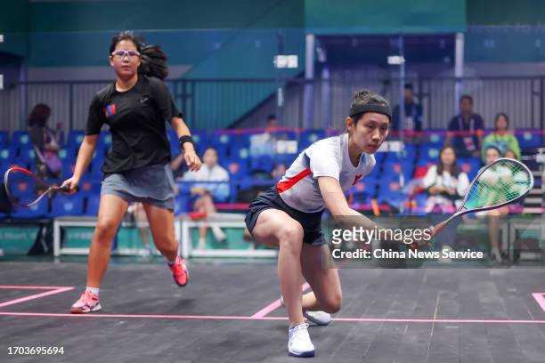 Ho Tze-Lok of Team Chinese Hong Kong competes against Altankhuyag Ariunbileg of Team Mongolia in the Squash - Women's Team Pool A on day three of the...