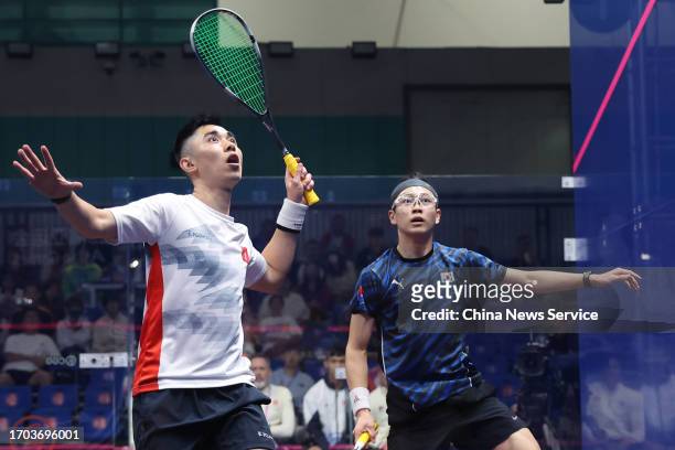 Tang Ming Hong of Team Chinese Hong Kong competes against Na Jooyoung of Team South Korea in the Squash - Men's Team Pool B on day three of the 19th...