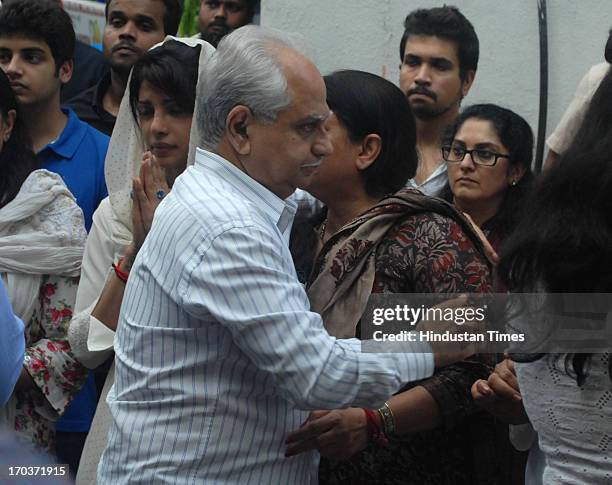 Bollywood producer Ramesh Sippy consoles Priyanka Chopra's mother Madhu Chopra during funeral of her father Ashok Chopra who was cremated at...