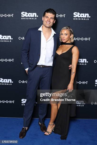 Matt Zukowski and Tammy Hembrow attend the global premiere of C*A*U*G*H*T at Sydney Opera House on September 27, 2023 in Sydney, Australia.