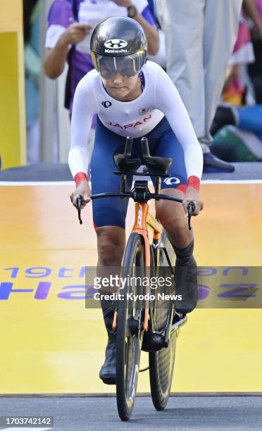 Eri Yonamine of Japan competes in the women's individual road cycling time trial event at the Asian Games in Hangzhou, China, on Oct. 3, 2023.