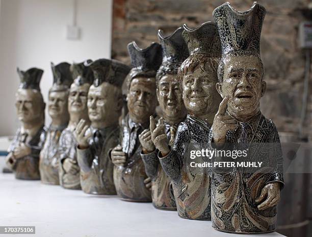 Toby jugs depicting the G8 leaders are pictured in the studio of Peter Meanley, Head of Ceramics at the University of Ulster, in Bangor, Northern...