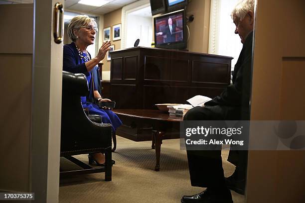 Sen. Barbara Boxer talks to Rep. Jim McDermott prior to a news conference June 12, 2013 on Capitol Hill in Washington, DC. Boxer and McDermott held a...