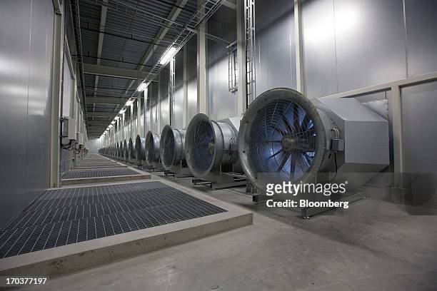 Fans operate inside the fan room at Facebook Inc.'s new data storage center near the Arctic Circle in Lulea, Sweden, on Wednesday, June 12, 2013. The...