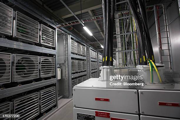 Electrical wiring sits attached to machinery inside the fan room at Facebook Inc.'s new data storage center near the Arctic Circle in Lulea, Sweden,...