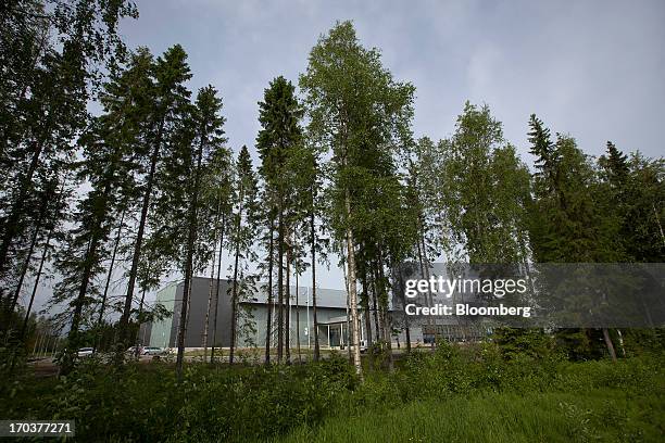 Trees surround part of the new data storage facility for Facebook Inc. Near the Arctic Circle in Lulea, Sweden, on Wednesday, June 12, 2013. The data...