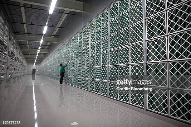 An employee inspects equipment in the air filter room inside Facebook Inc.'s new data storage center near the Arctic Circle in Lulea, Sweden, on...