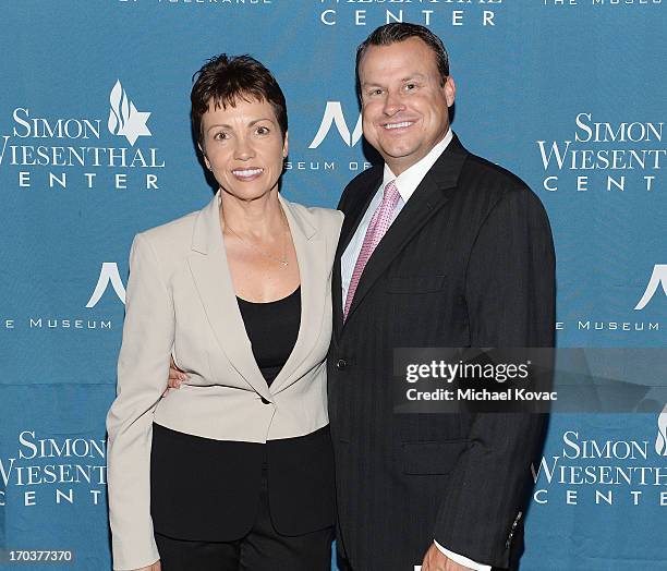 Steve Ghysels and Liz Ghysels arrive at the Simon Wiesenthal Center National Tribute Dinner at Regent Beverly Wilshire Hotel on June 11, 2013 in...