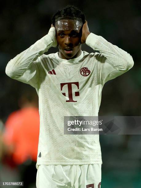 Mathys Tel of Bayern Munich celebrates after scoring his teams fourth goal during the DFB cup first round match between Preußen Münster and FC Bayern...