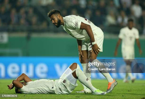 Serge Gnabry of Bayern Munich leaves injured the pit during the DFB cup first round match between Preußen Münster and FC Bayern München at...