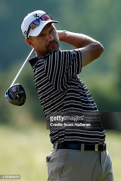 Cliff Kresge of the United States hits a tee shot during a practice round prior to the start of the 113th U.S. Open at Merion Golf Club on June 12,...