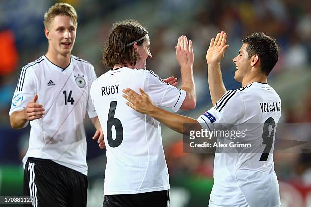Sebastian Rudy of Germany celebrates his team's second goal with team mates Sebastian Polter and Kevin Volland during the UEFA European U21...