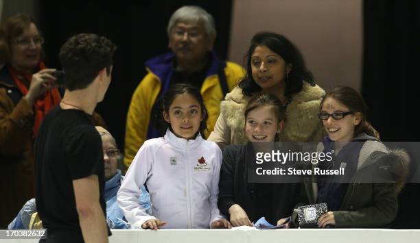Fans await an autograph from Javier Fernandez as skaters prepare to compete in the ISU World Figure Skating Championships at Budweiser Gardens.