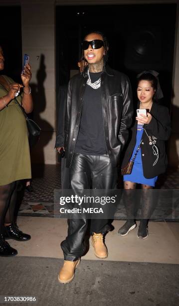 Tyga is seen leaving Costes restaurant in on October 2, 2023 in Paris, France.