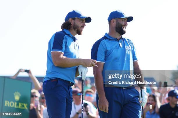 Tommy Fleetwood and Jon Rahm of Team Europe look on at the 16th tee during a practice round prior to the 2023 Ryder Cup at Marco Simone Golf Club on...