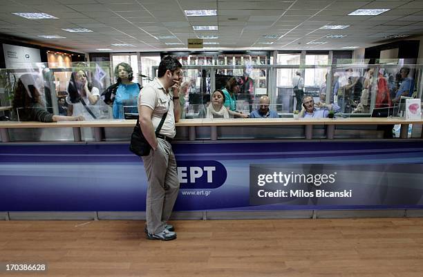 Workers occupy the main hall of the headquarters of the Greek public broadcaster ERT on June 12, 2013 in Athens, Greece. Journalists have refused to...