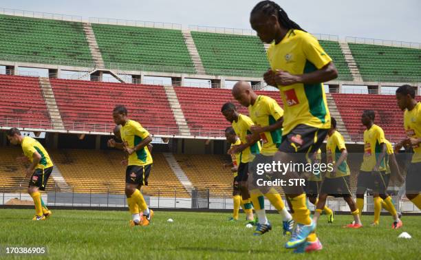 South African national football team players take part in a training session on June 12, 2013 at the Amadou Ahidjo stadium in Yaounde before their...