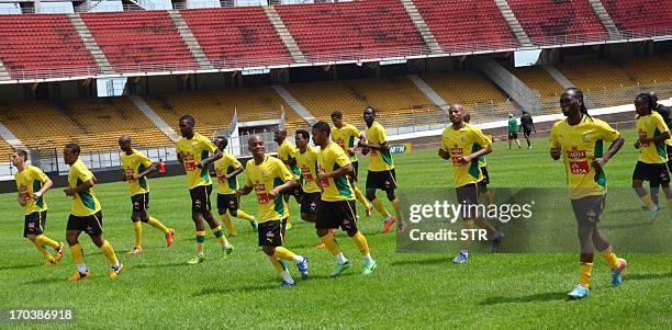 South African national football team players take part in a training session on June 12, 2013 at the Amadou Ahidjo stadium in Yaounde before their...