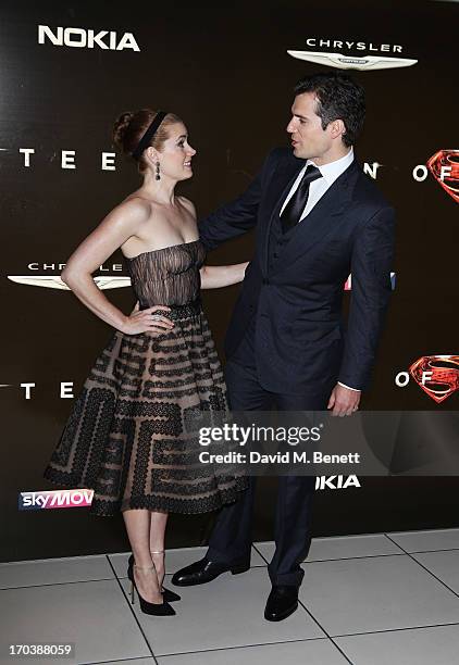 Actors Henry Cavill and Amy Adams attend the UK Premiere of 'Man of Steel' at Odeon Leicester Square on June 12, 2013 in London, England.