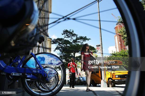 Pedestrians walk through the Fort Green neighborhood, a rapidly glowing cultural district of Brooklyn which is located close to Manhattan, on June...