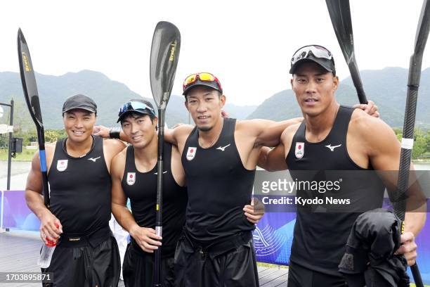 Members of Japanese team pose for photo after competing in the men's kayak four 500-meter final at the Asian Games in Hangzhou, China, on Oct. 3,...