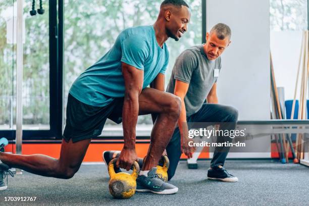 personal trainer - hand weight stock pictures, royalty-free photos & images