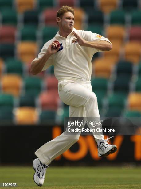 Ashley Noffke of the Queensland Bulls in action during day two of the Pura Cup Match between the the Tasmanian Tigers and the Queensland Bulls played...