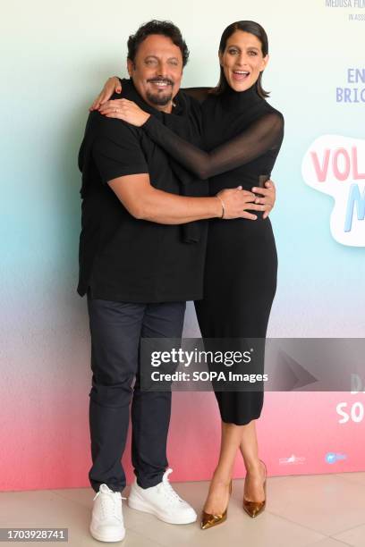 Enrico Brignano and Giulia Bevilacqua attend at the photocall of the movie Volevo un figlio maschio at the Paparazzi Terrace of Visconti Le Meridien...