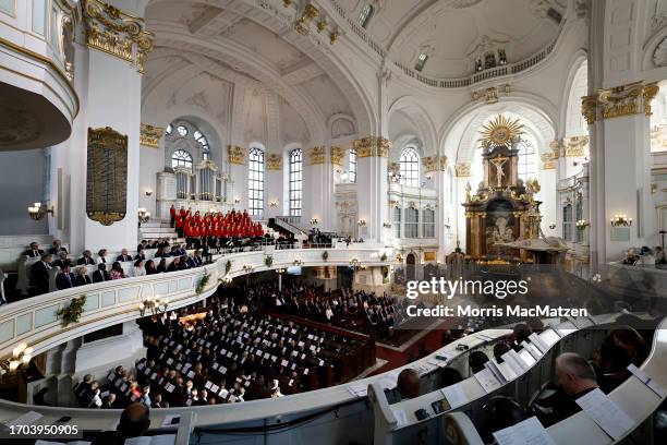 General Overview shows guests and participants attending a religious service at St. Michaelis church prior to celebrations on German Unity Day on...