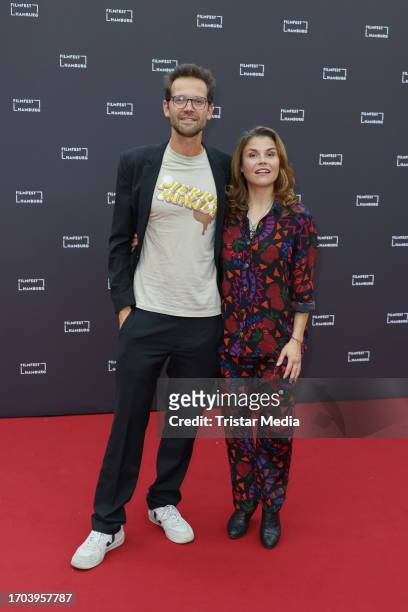 Jonas Grosch and Katharina Wackernagel attend the "Last Exit Schinkenstrasse" premiere during the Hamburg film festival at Cinemaxx on October 2,...